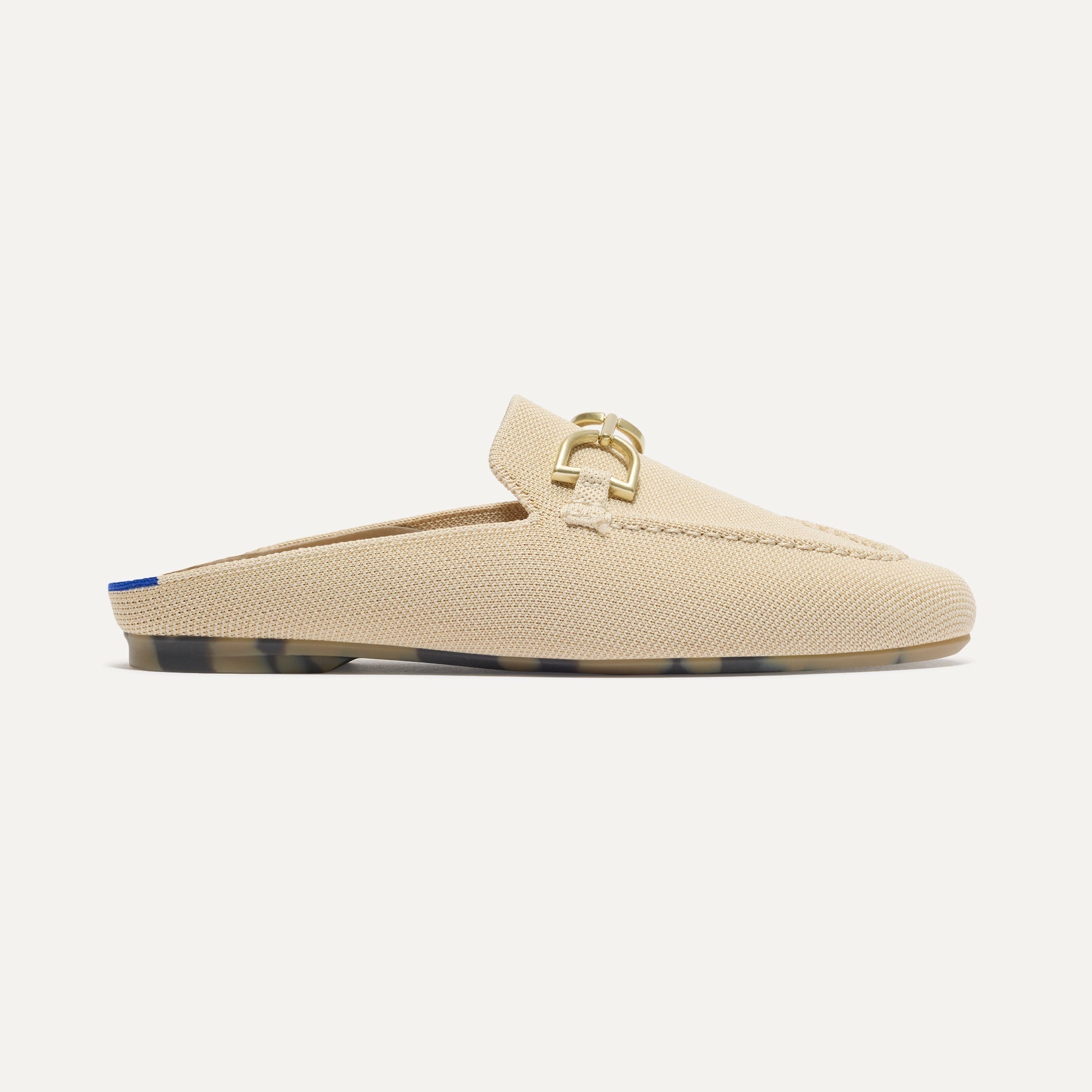 side | The Double Bit Loafer Mule in Sandstone shown from the side.