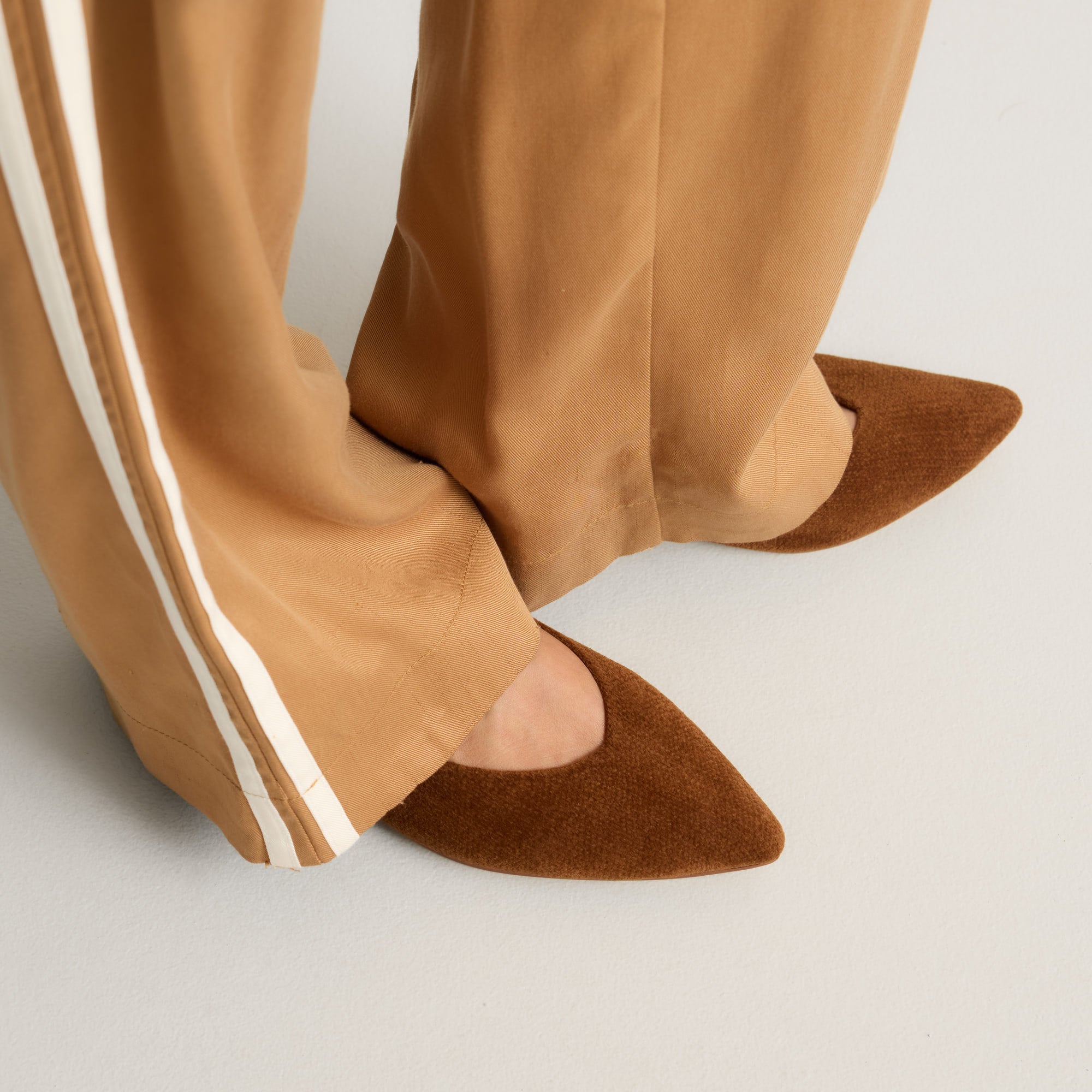 hover | Model wearing The Point III in ReVelvet Russet.
