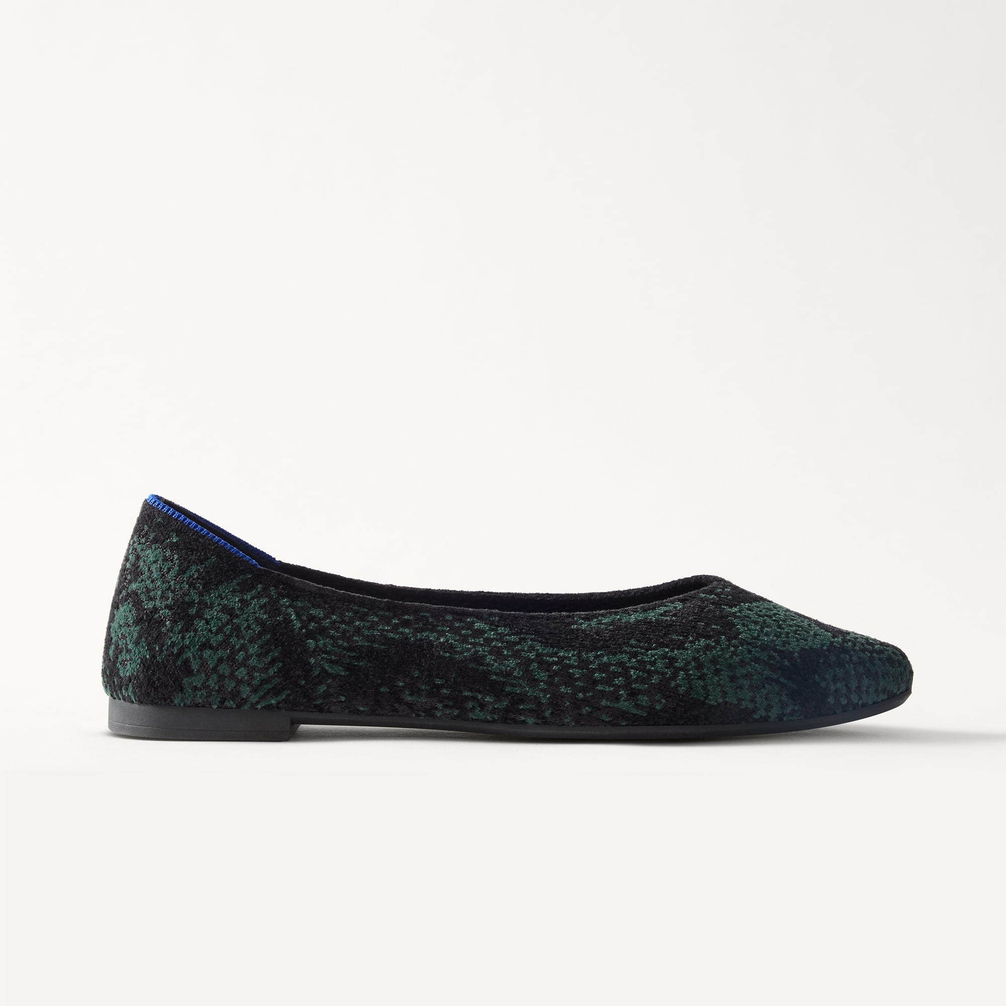 side | The Point III in ReVelvet Evergreen Python shown from the side. 