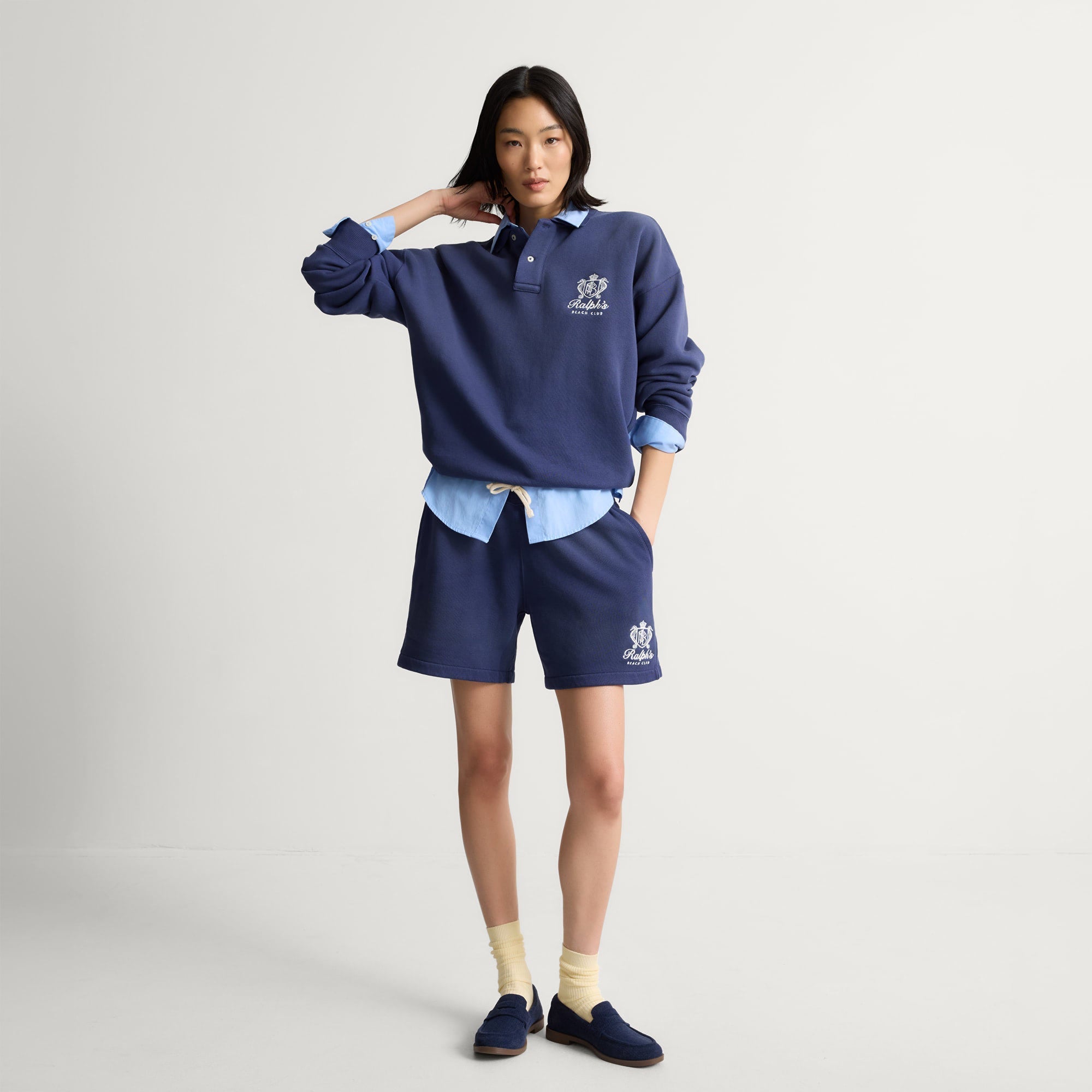 model | Alternate view of a model wearing The Penny Loafer in ReVelvet Navy. 