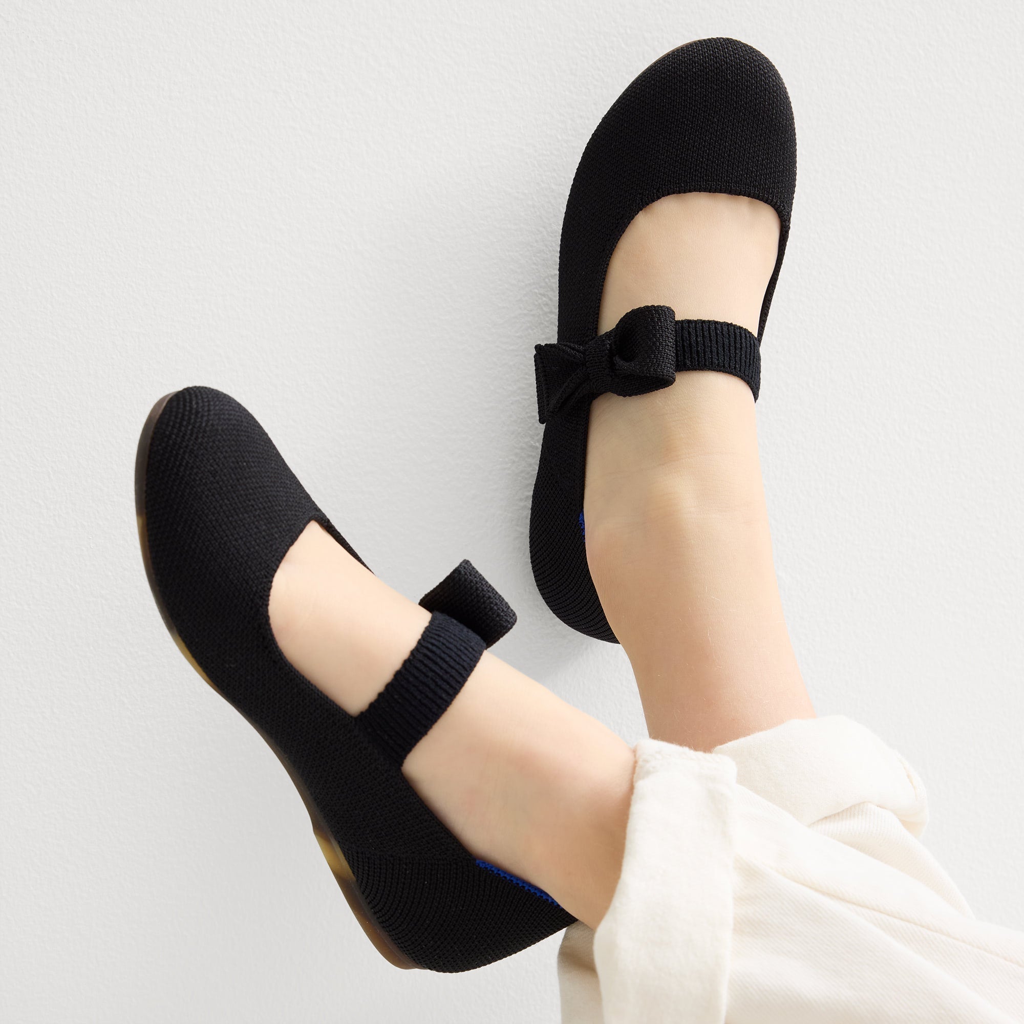 hover | Model wearing The Kids Tux Bow Mary Jane in Black.