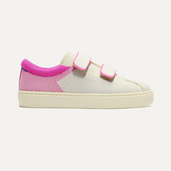 side | The Kids Strap Sneaker in Pink Taffy shown from the side. 