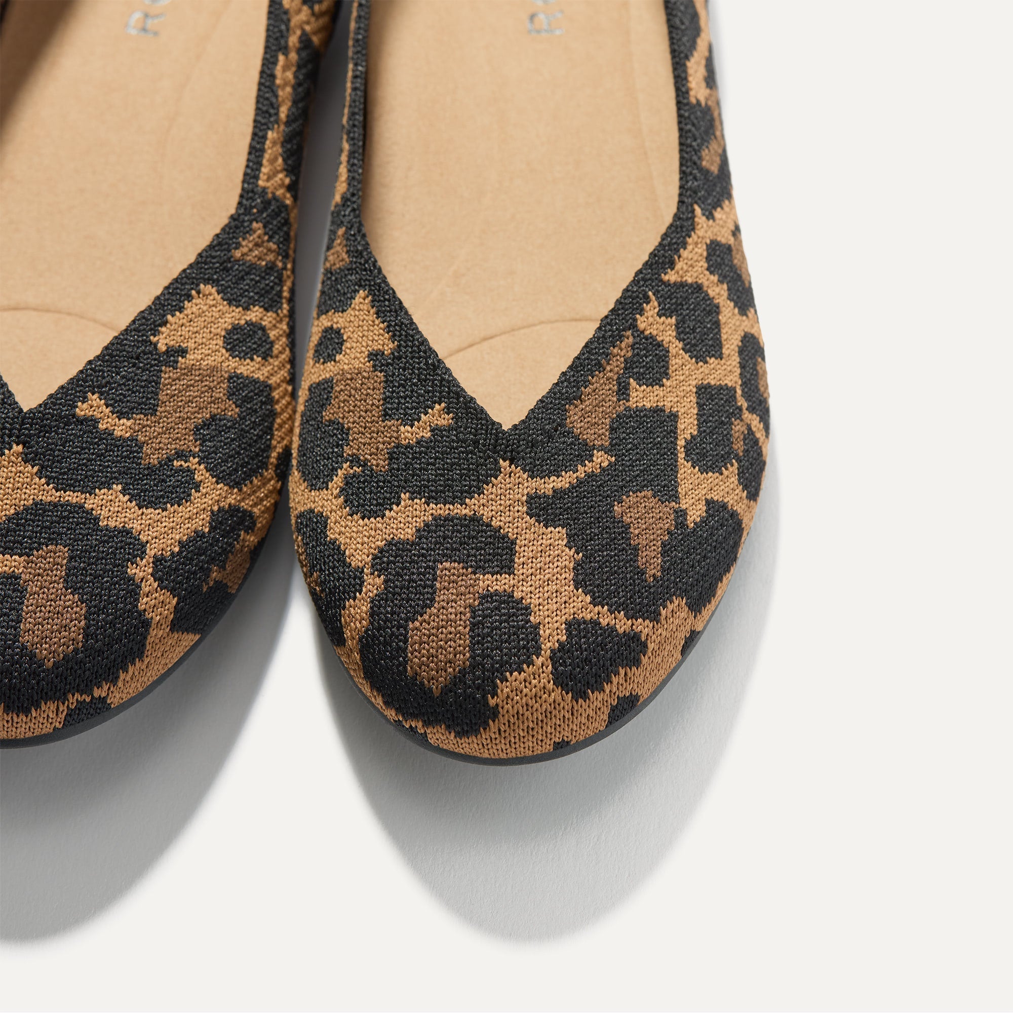 Close up of the toe and vamp of The Daily Flat in Sable Spot. 
