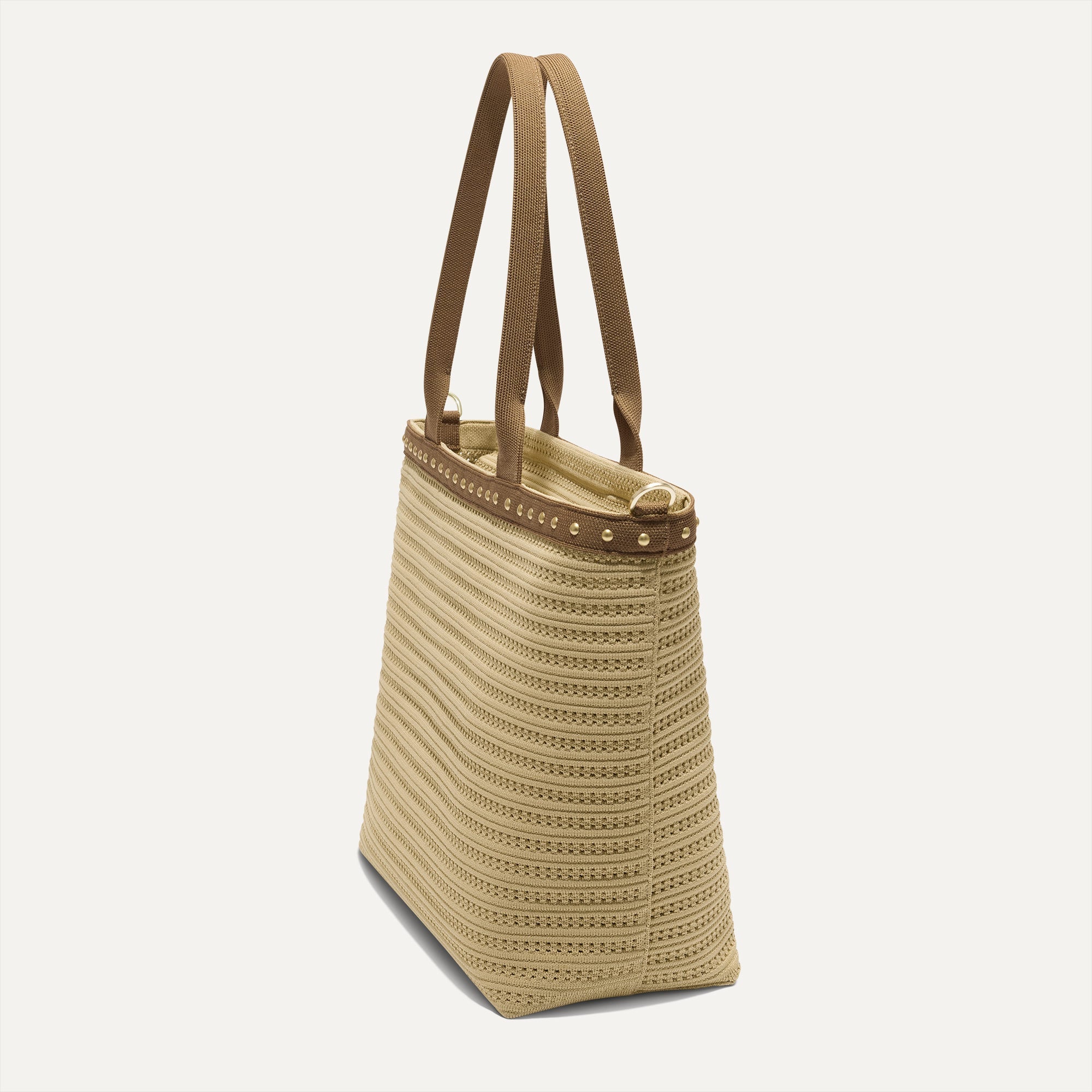 The Lightweight Zip Tote in Brown Butter Crochet, shown from the side.
