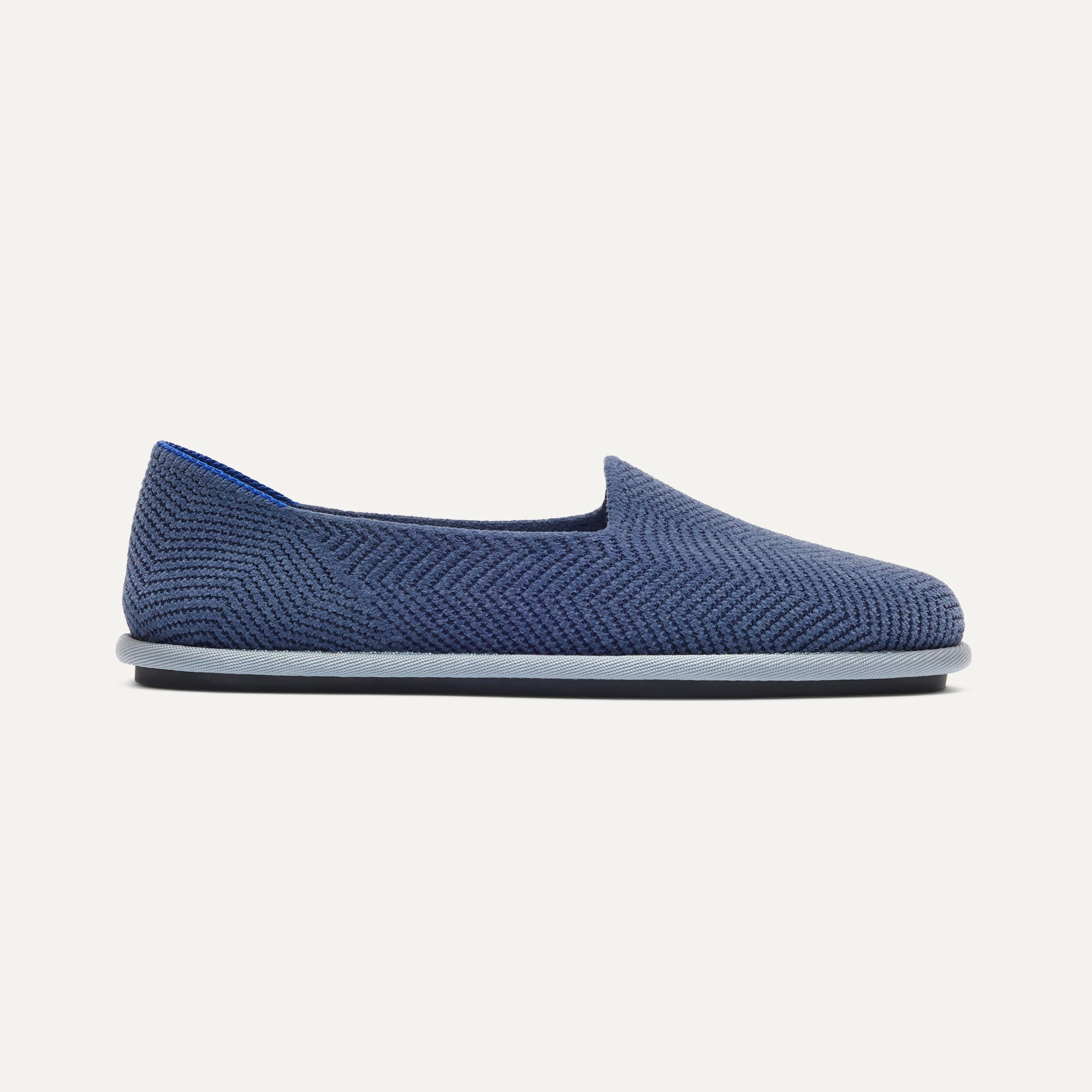 side | The Cruiser Loafer in ReVelvet Fog Herringbone shown from the side.